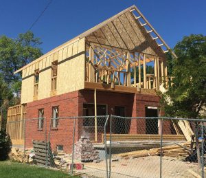 ArcWest Architects Residential Addition Pontiac - progress - trusses up